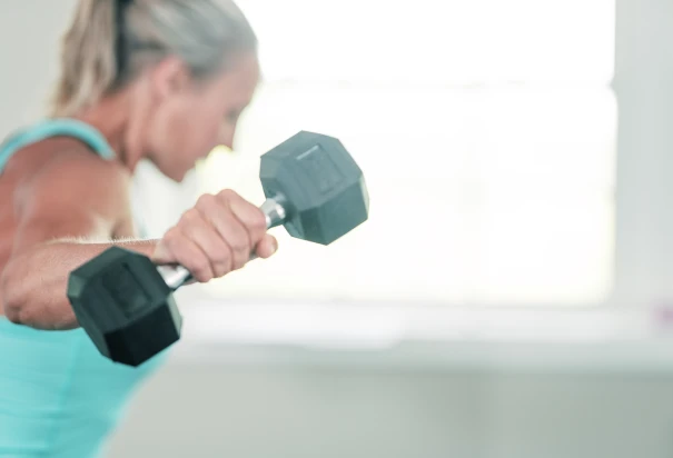 Woman doing dumbbell workout