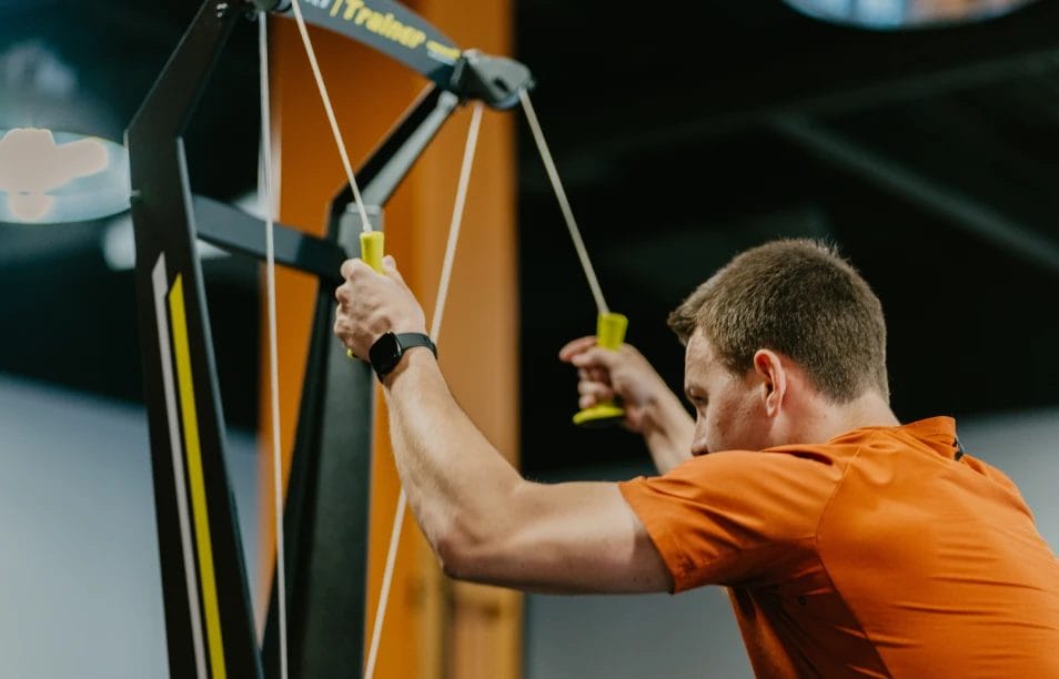 Man doing cable exercises